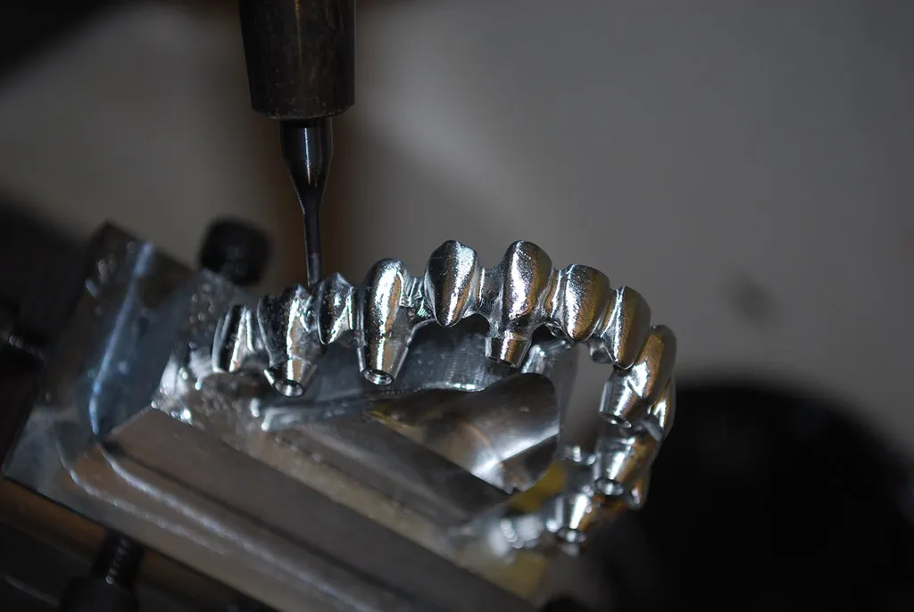 Full-arch implant bridge framework machined from a CAD design