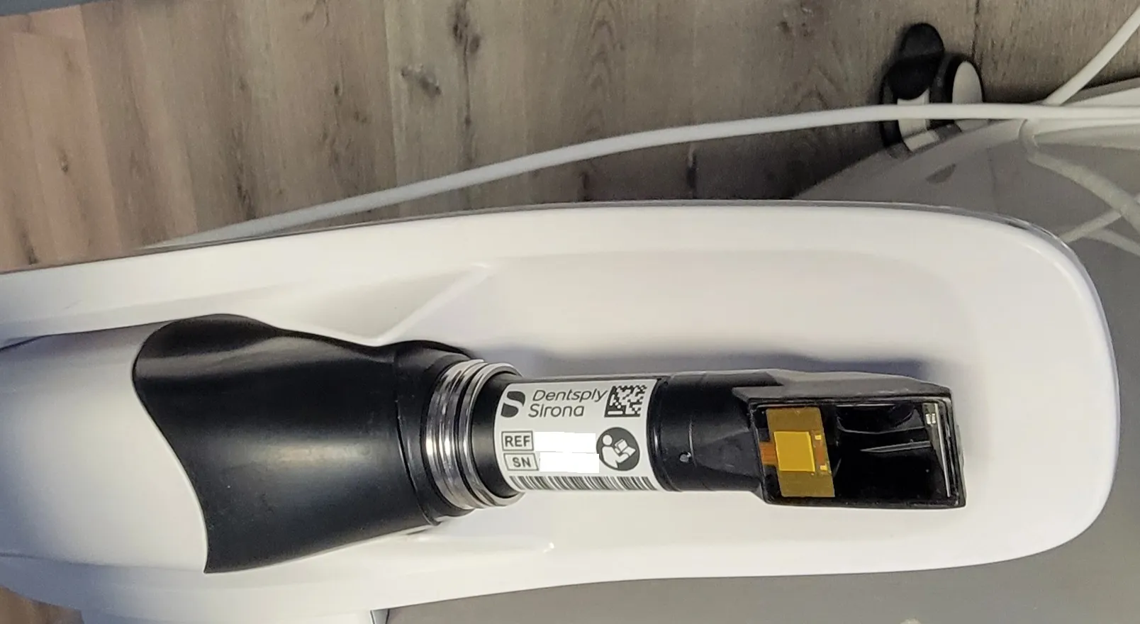 Intraoral scanner capturing a digital dental impression